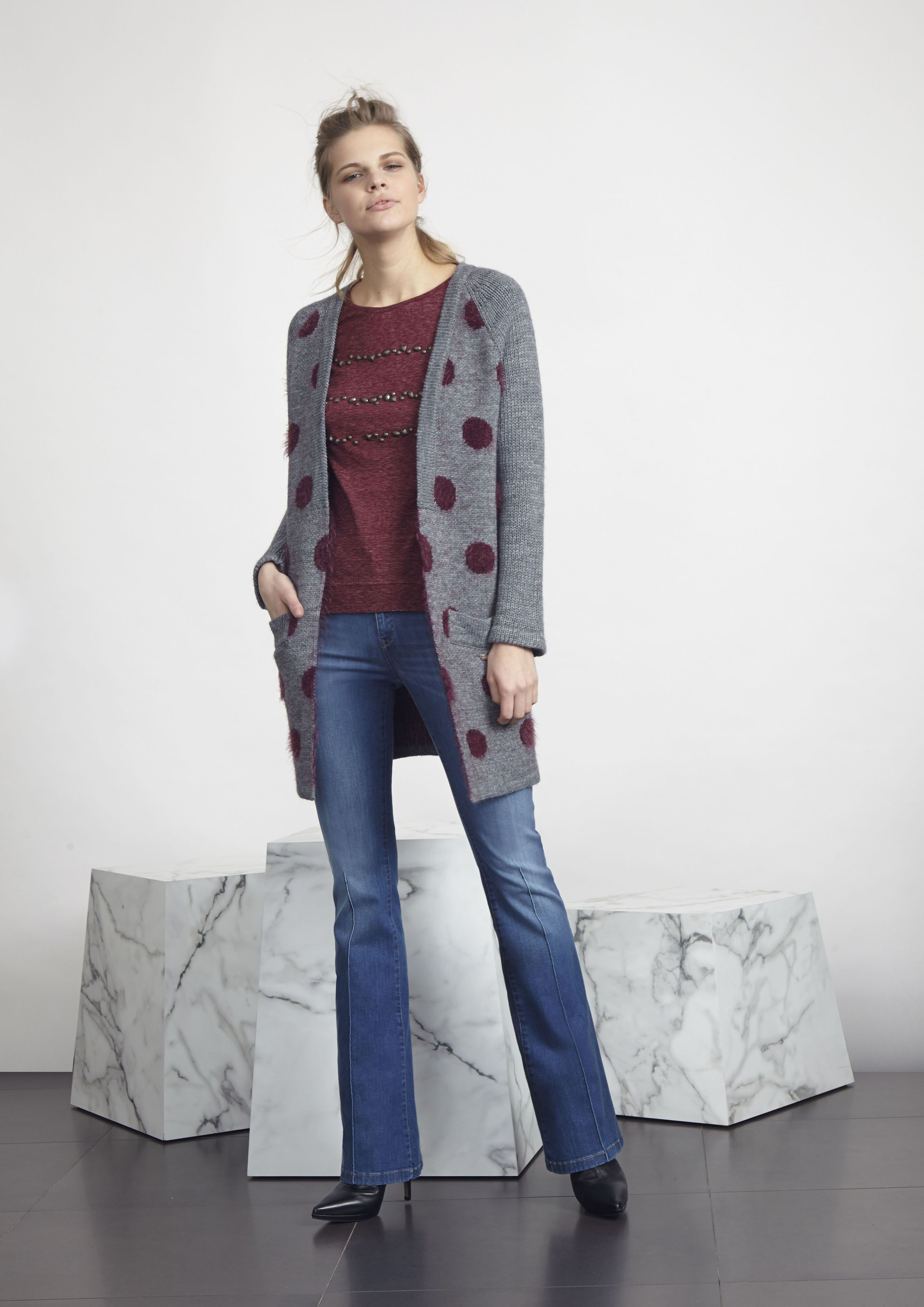 Grey jacket with large contrast polka dots