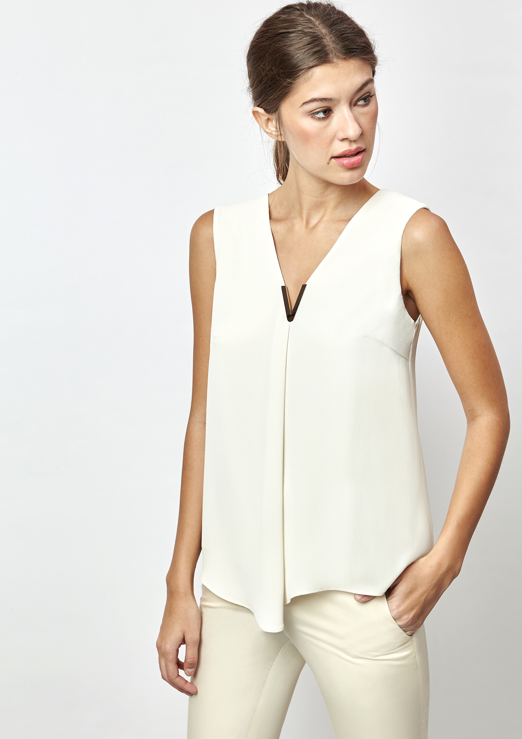 Ecru blouse with low back