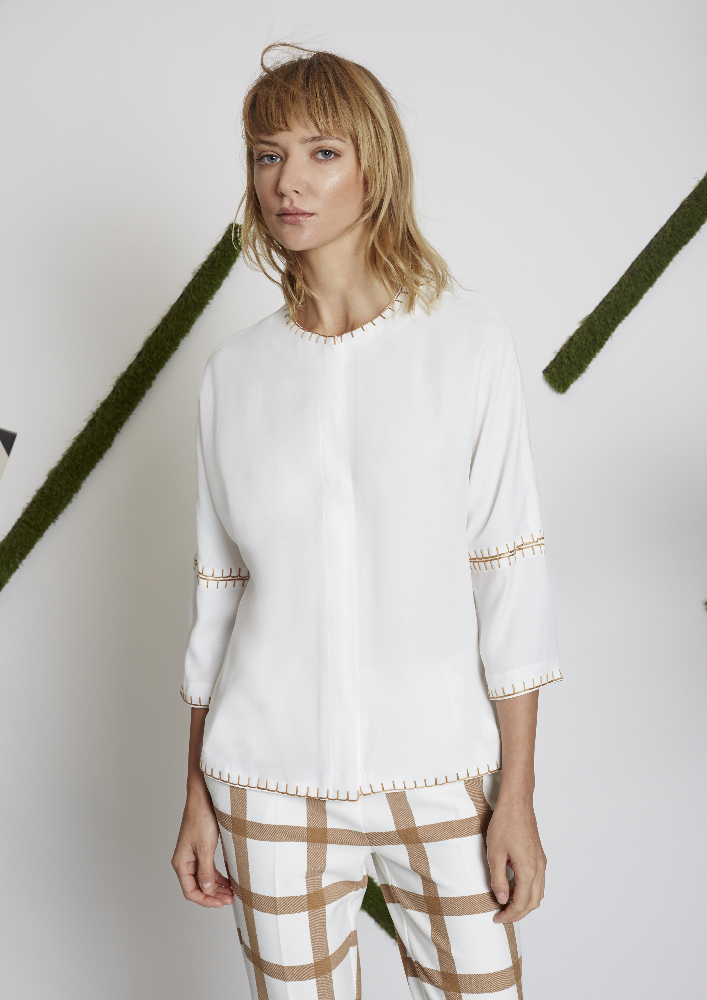 White blouse with three-quarter length sleeves