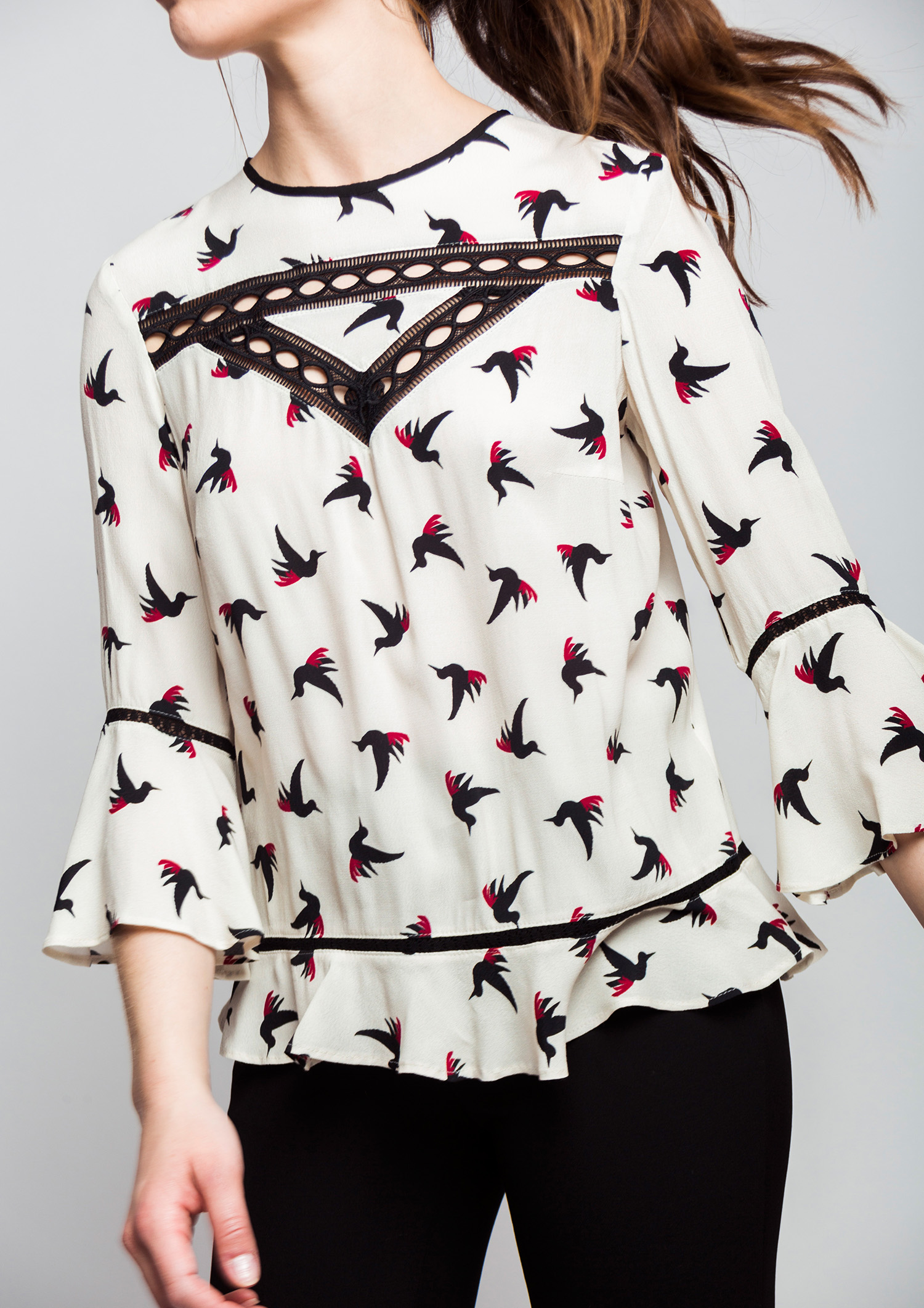 Bird print blouse.