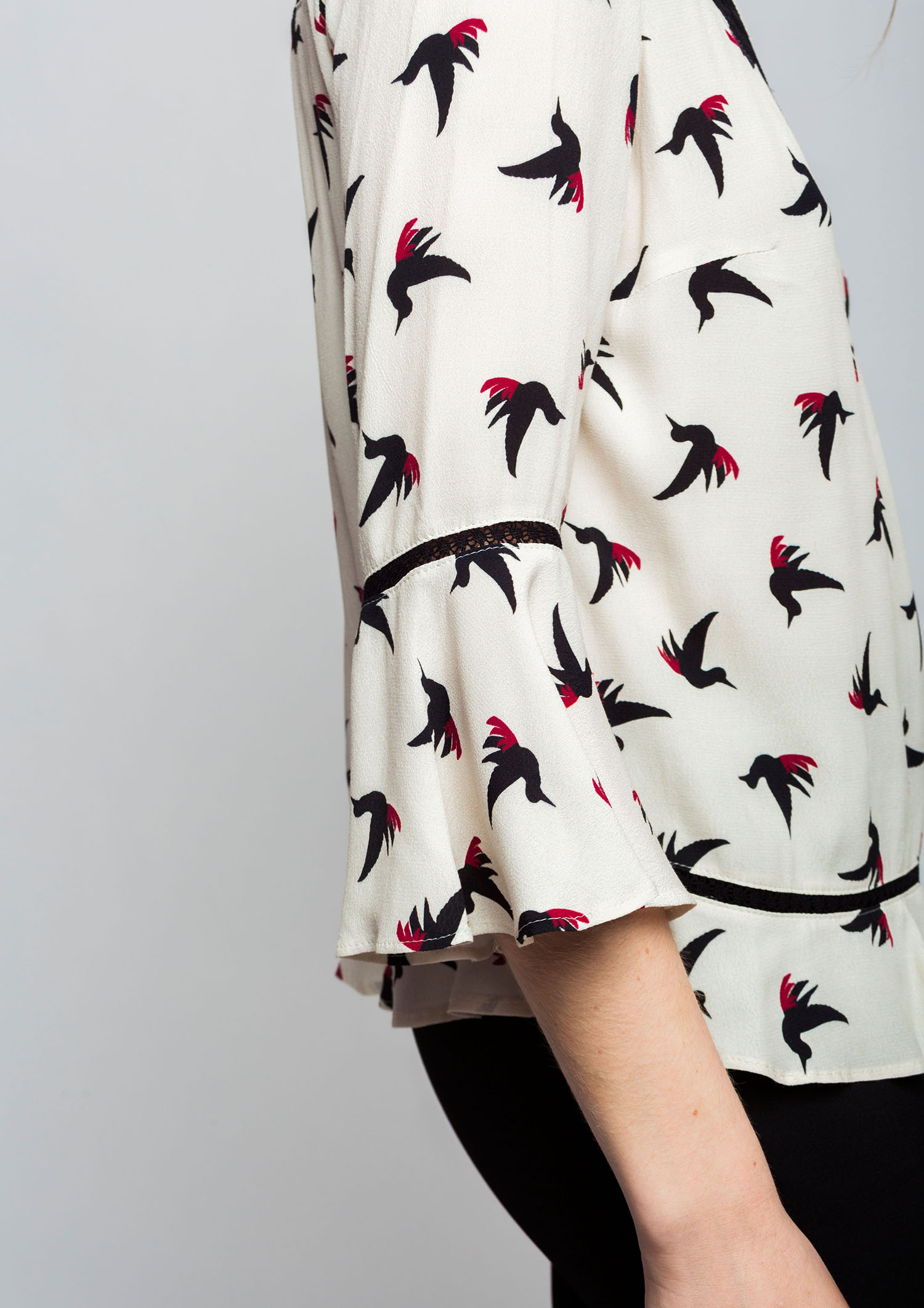 Bird print blouse.