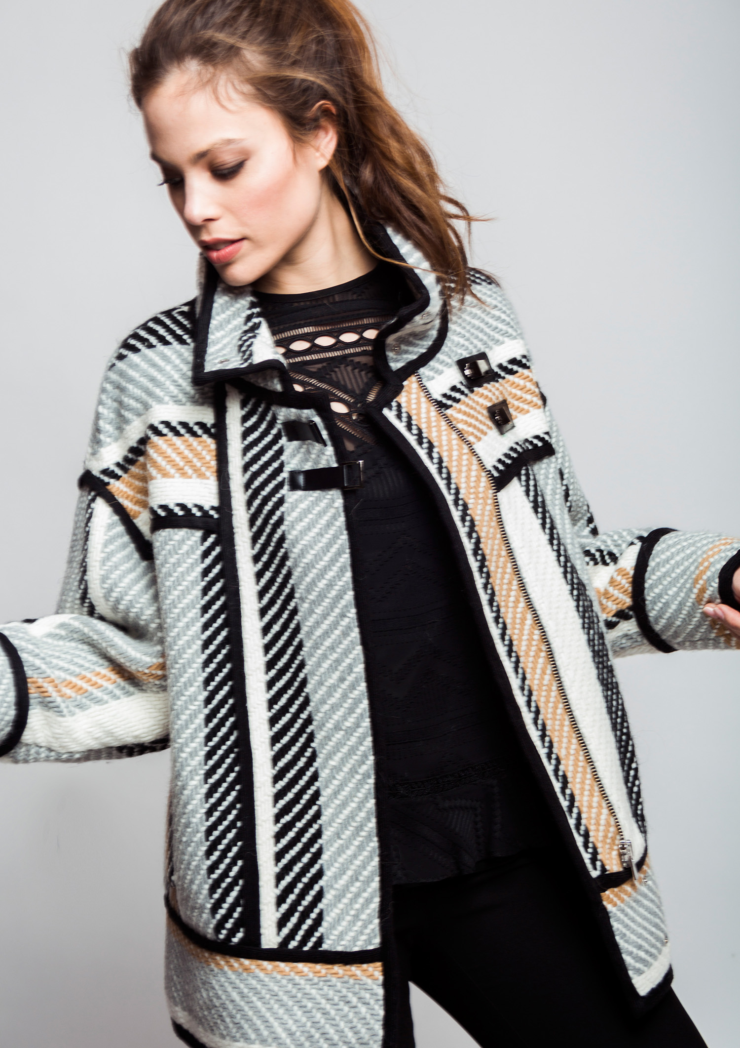 Striped jacket with black piping.