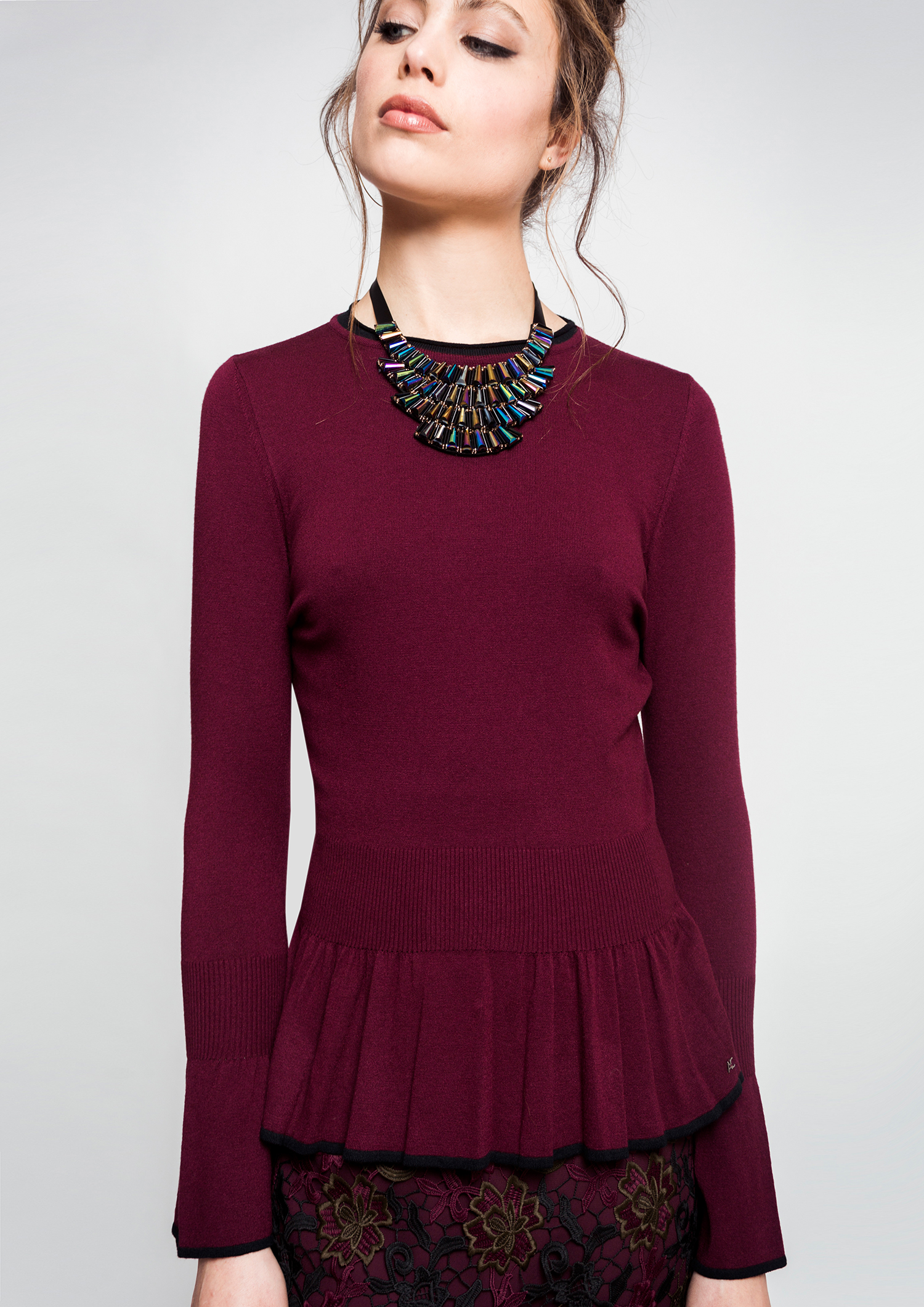 Maroon knit sweater.