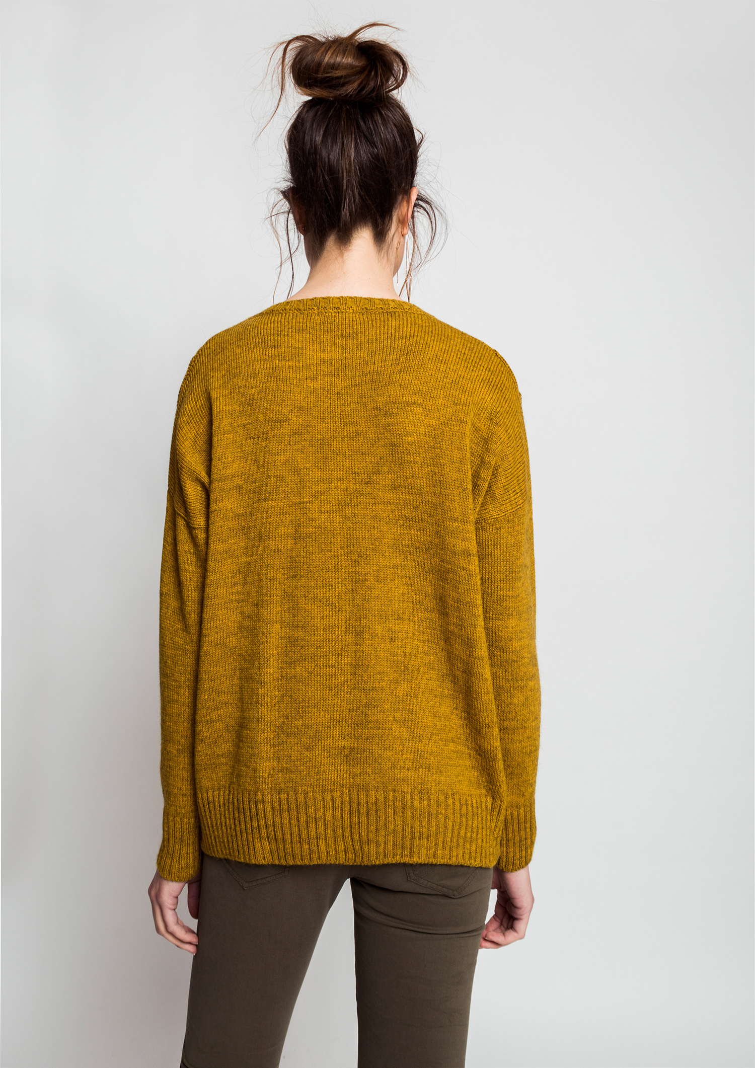 Mustard knit jumper.