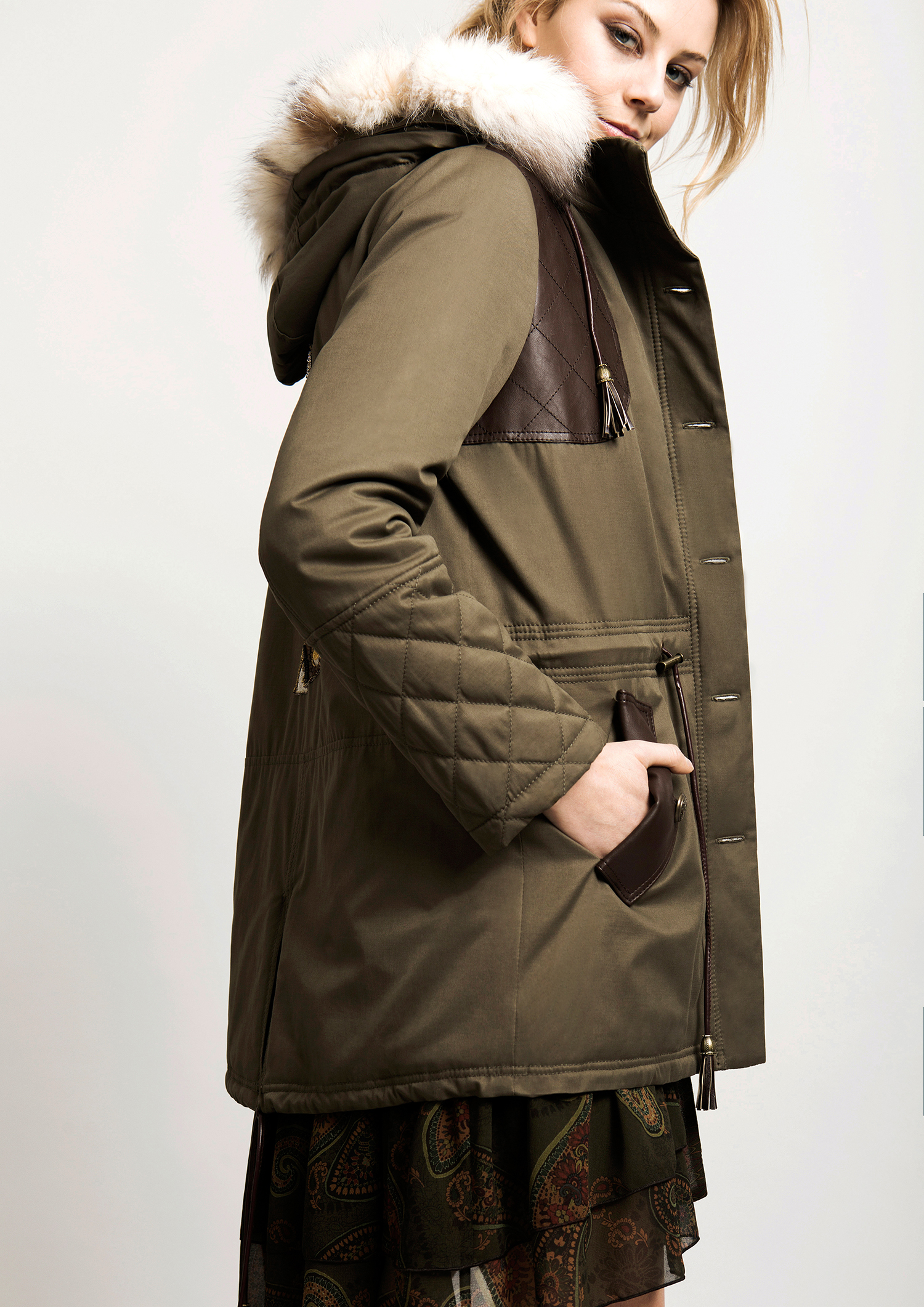 Khaki parka with hood.