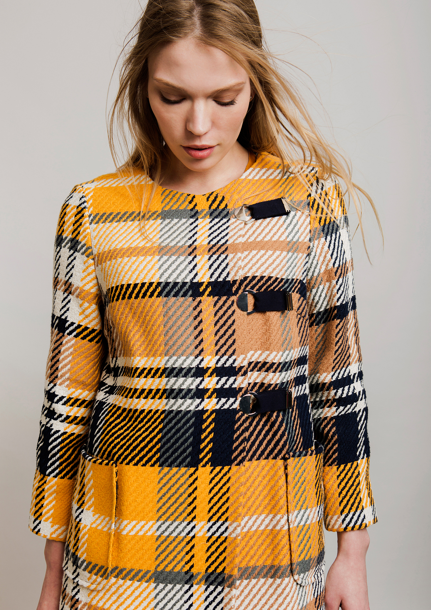 Straight yellow checked coat.