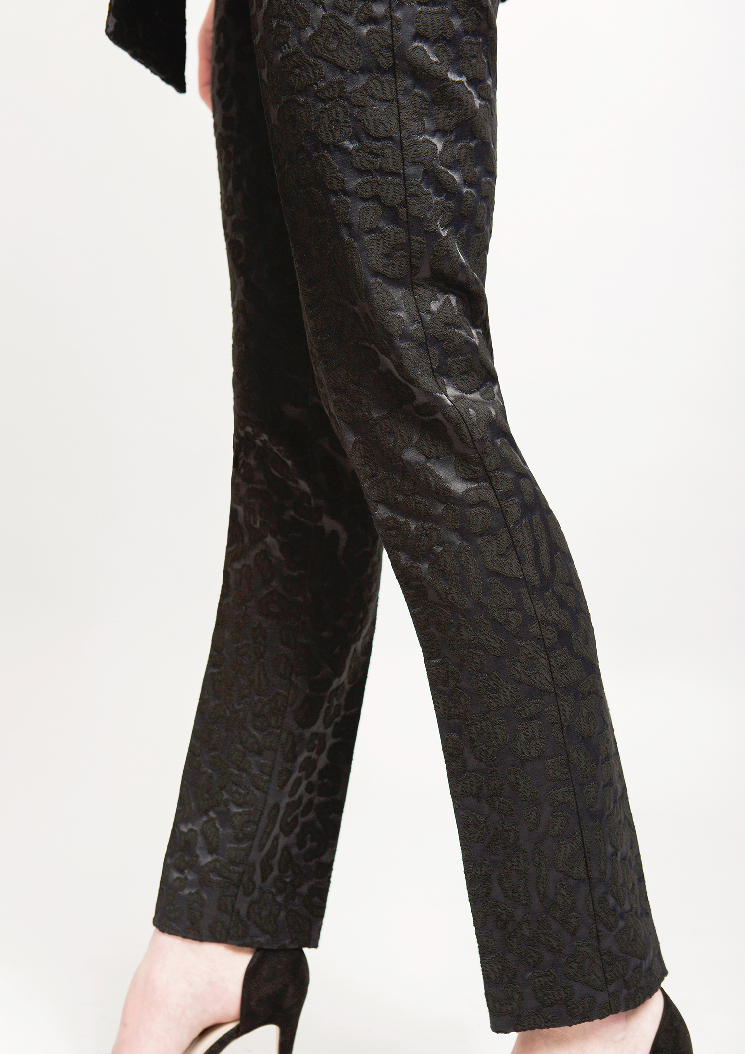 Black jacquard trousers.