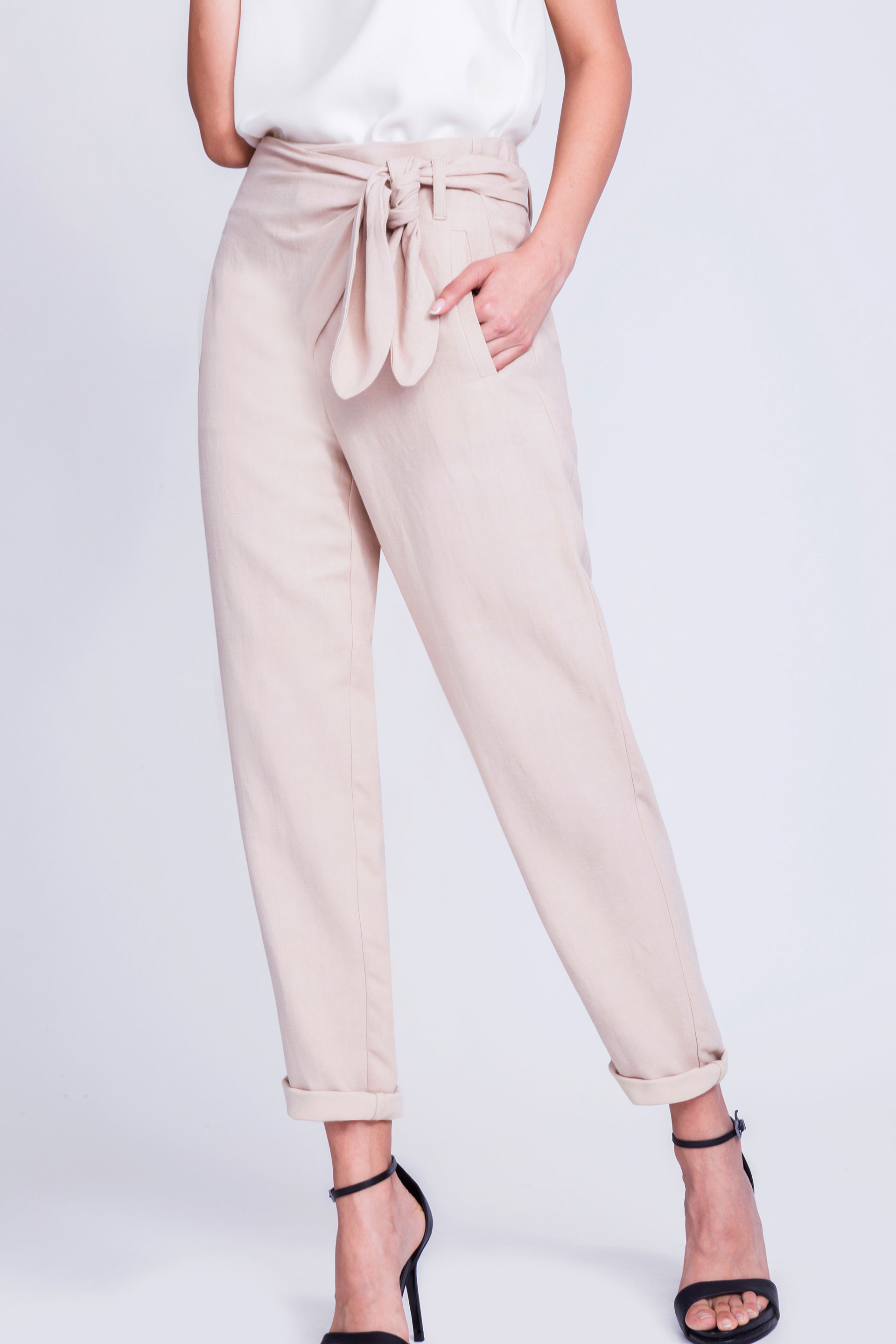 Beige trousers with tie detail