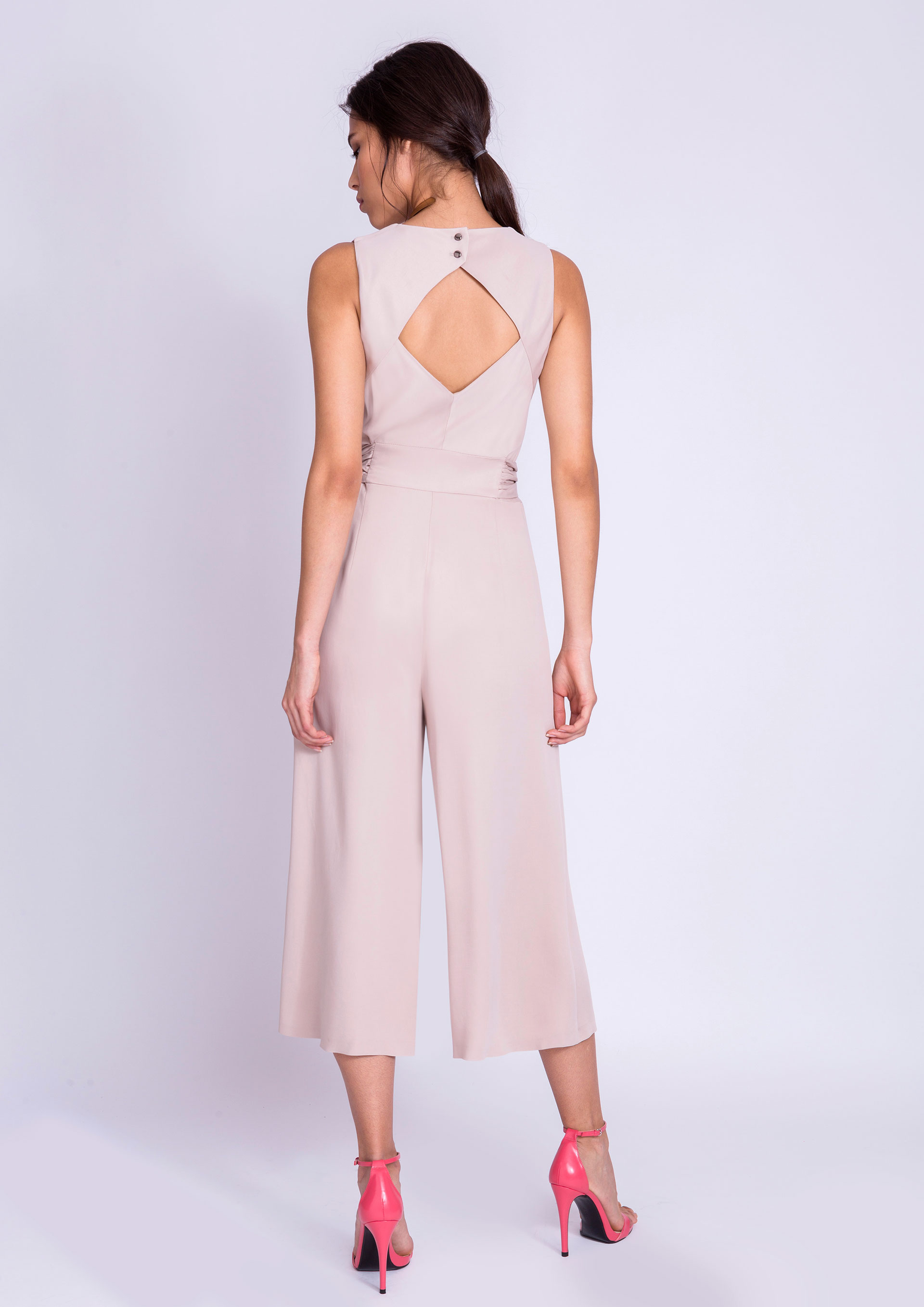 Beige jumpsuit with front knot