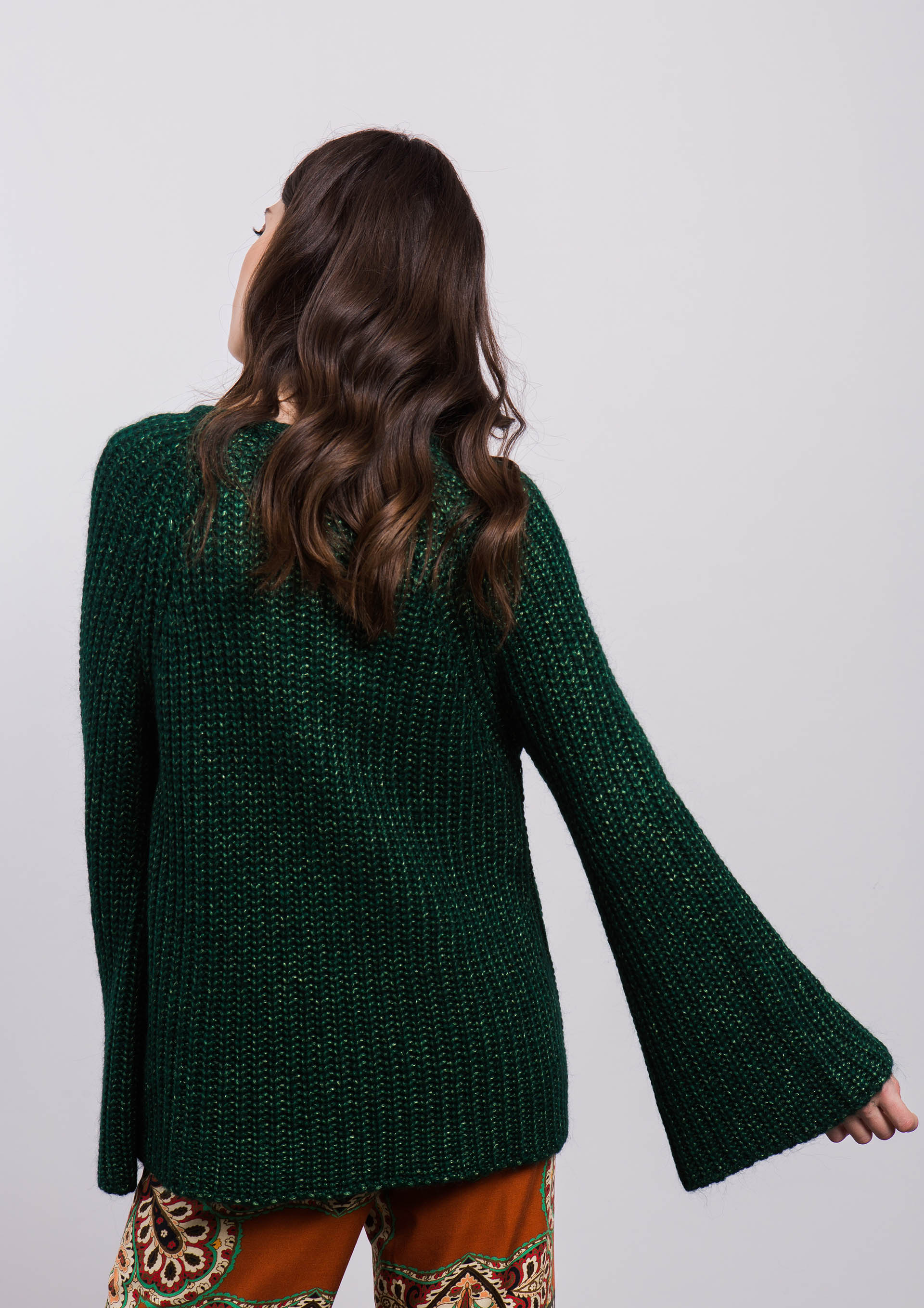 Green knit sweater with bell sleeve
