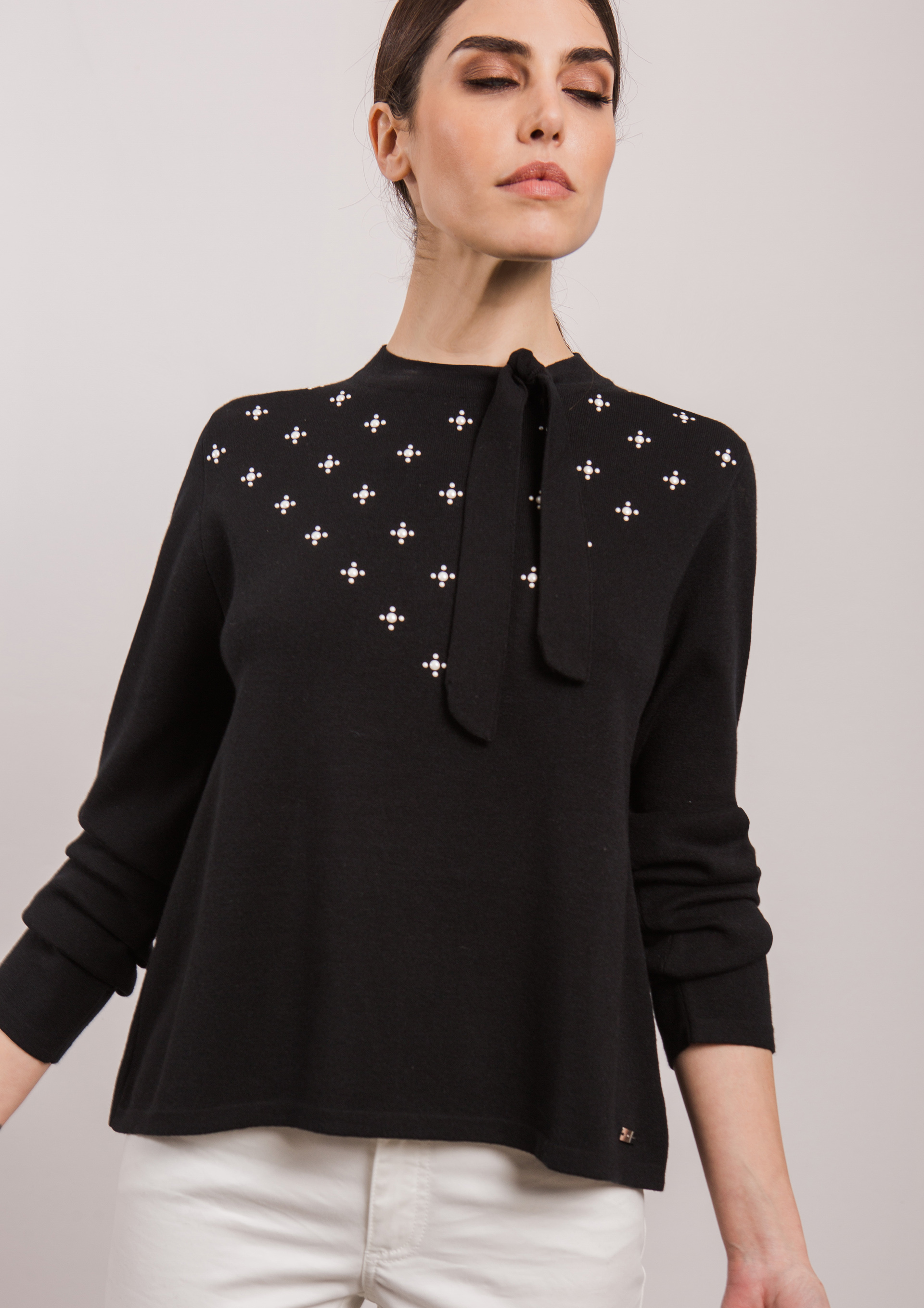 Black sweater with bow neck