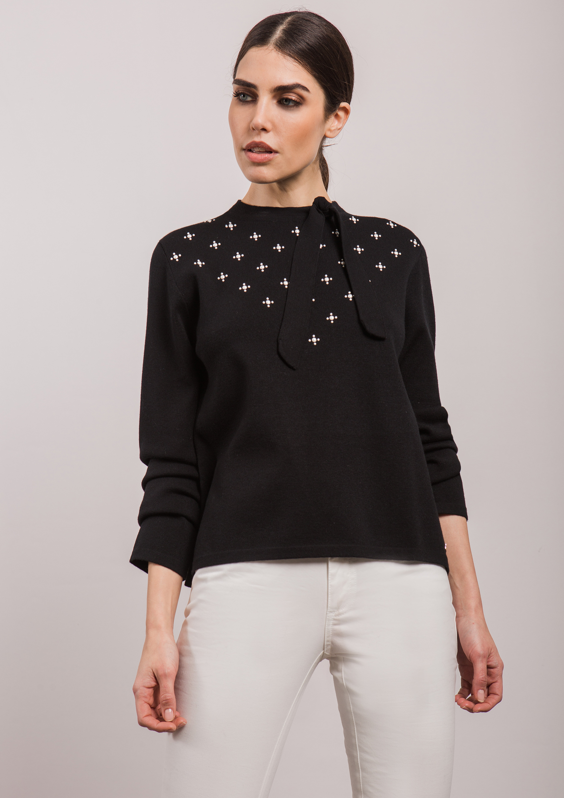 Black sweater with bow neck