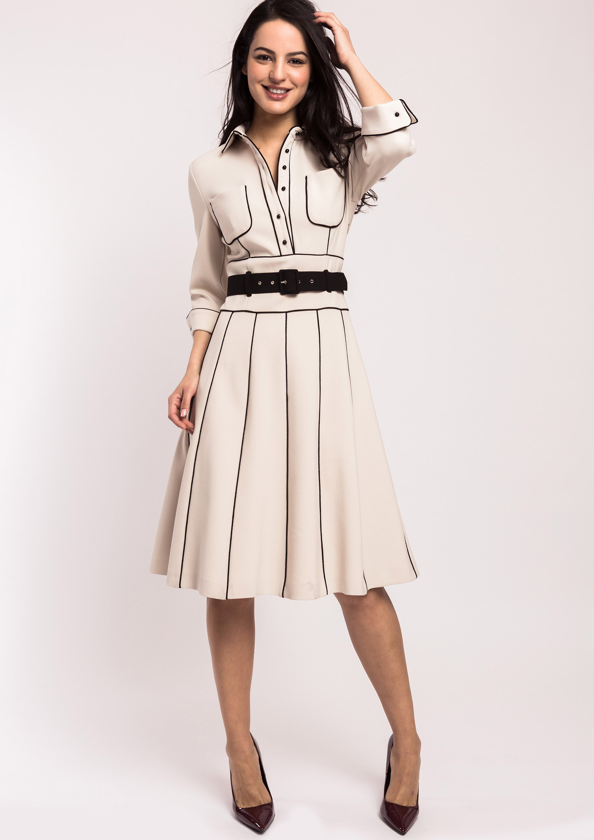 Beige A-line dress with contrast piping