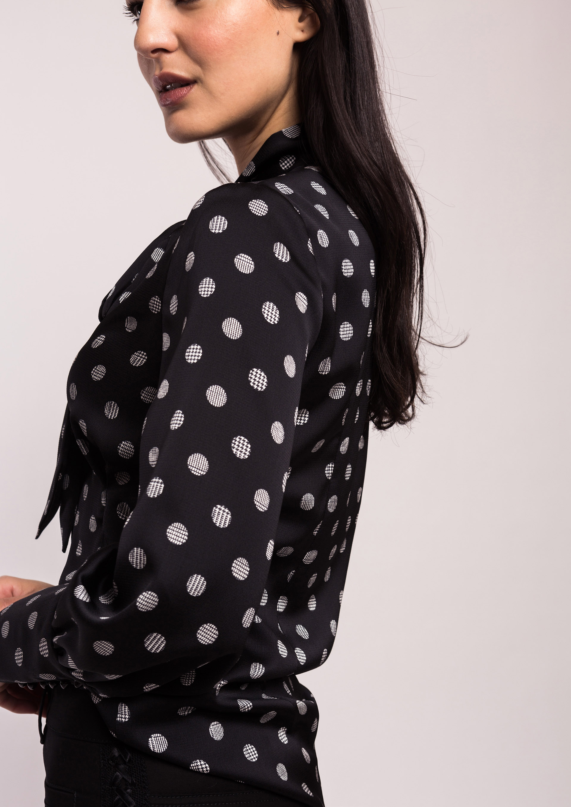 Black polka dot blouse with bow