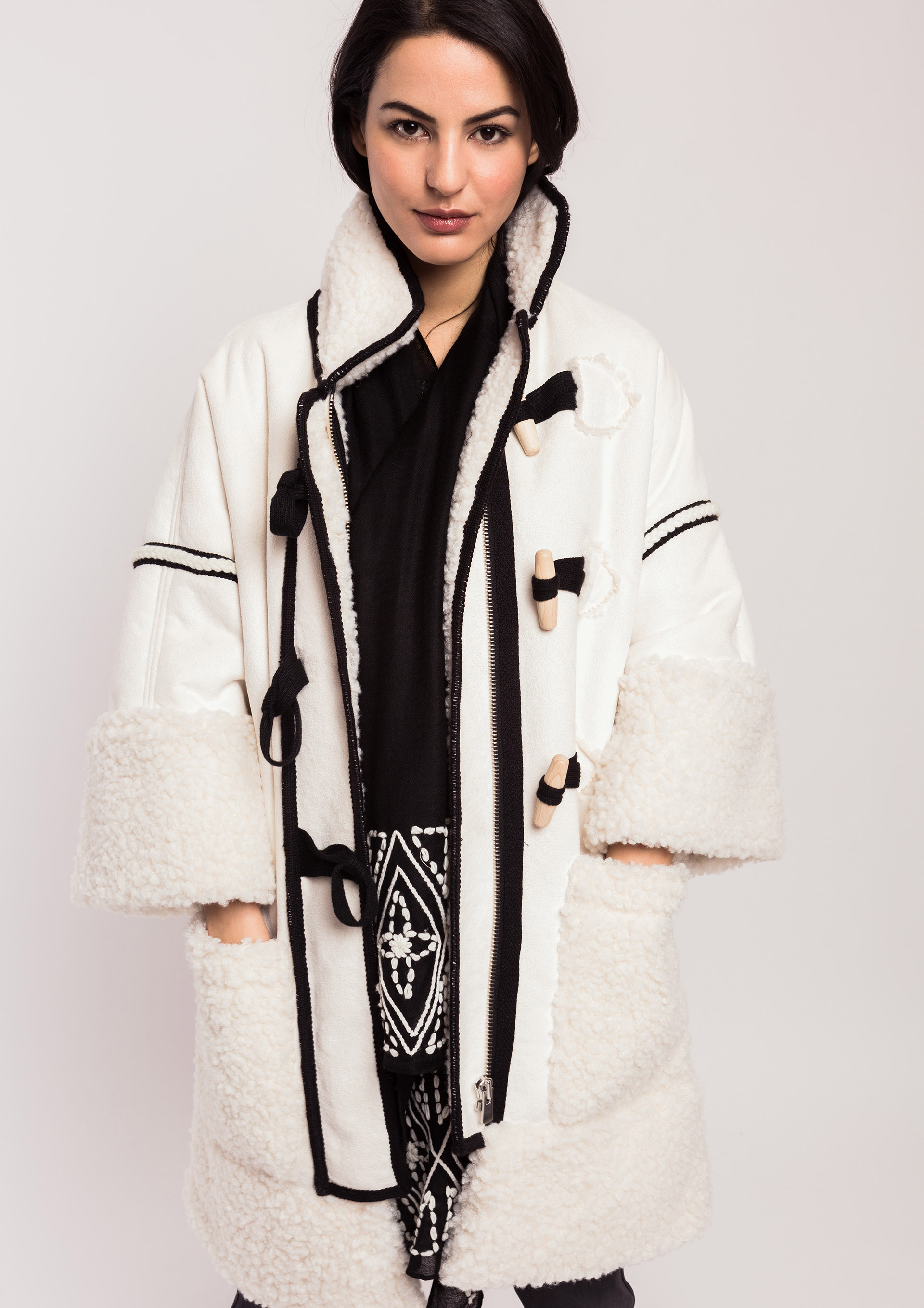 Ecru jacket with black piping