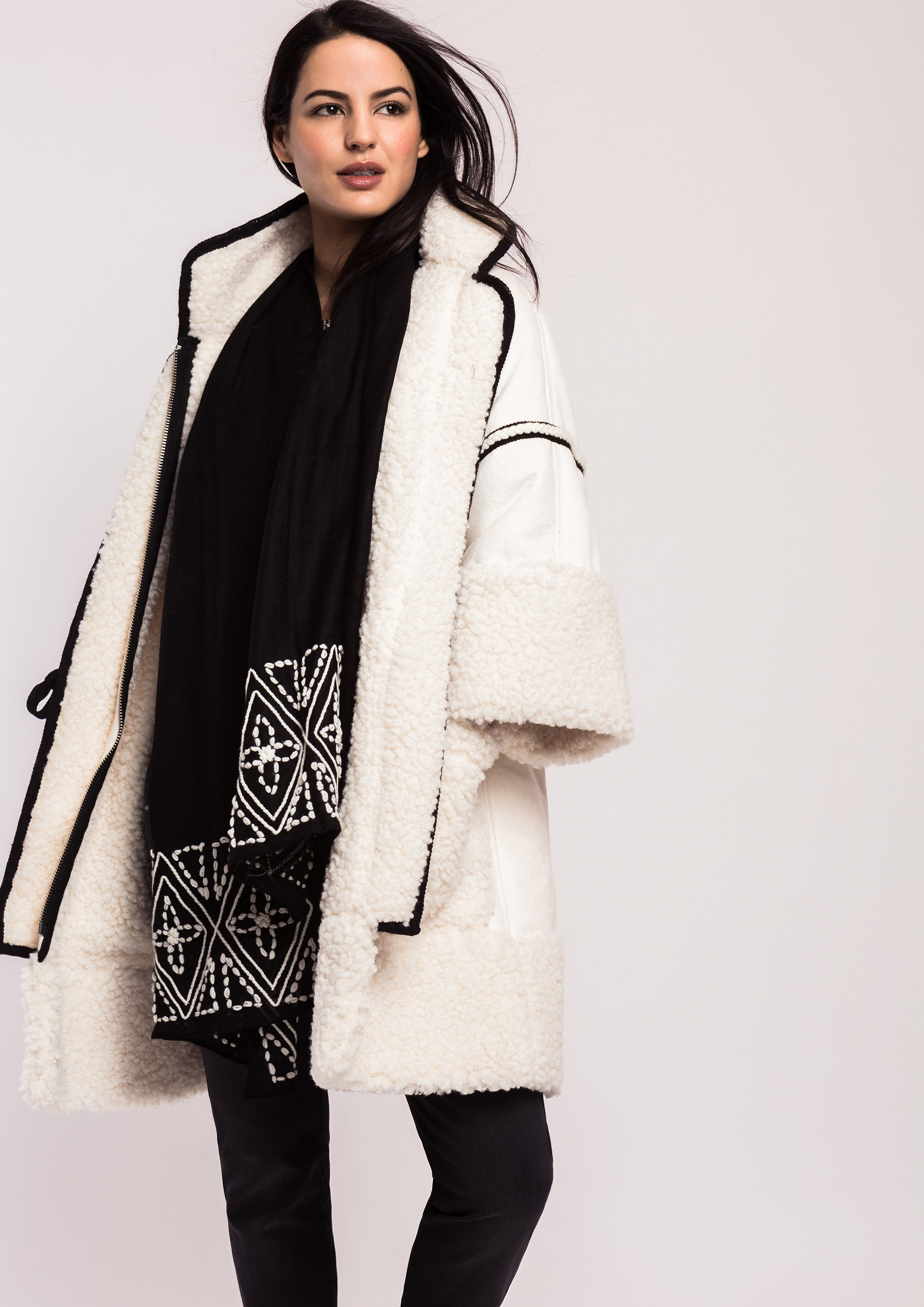 Ecru jacket with black piping