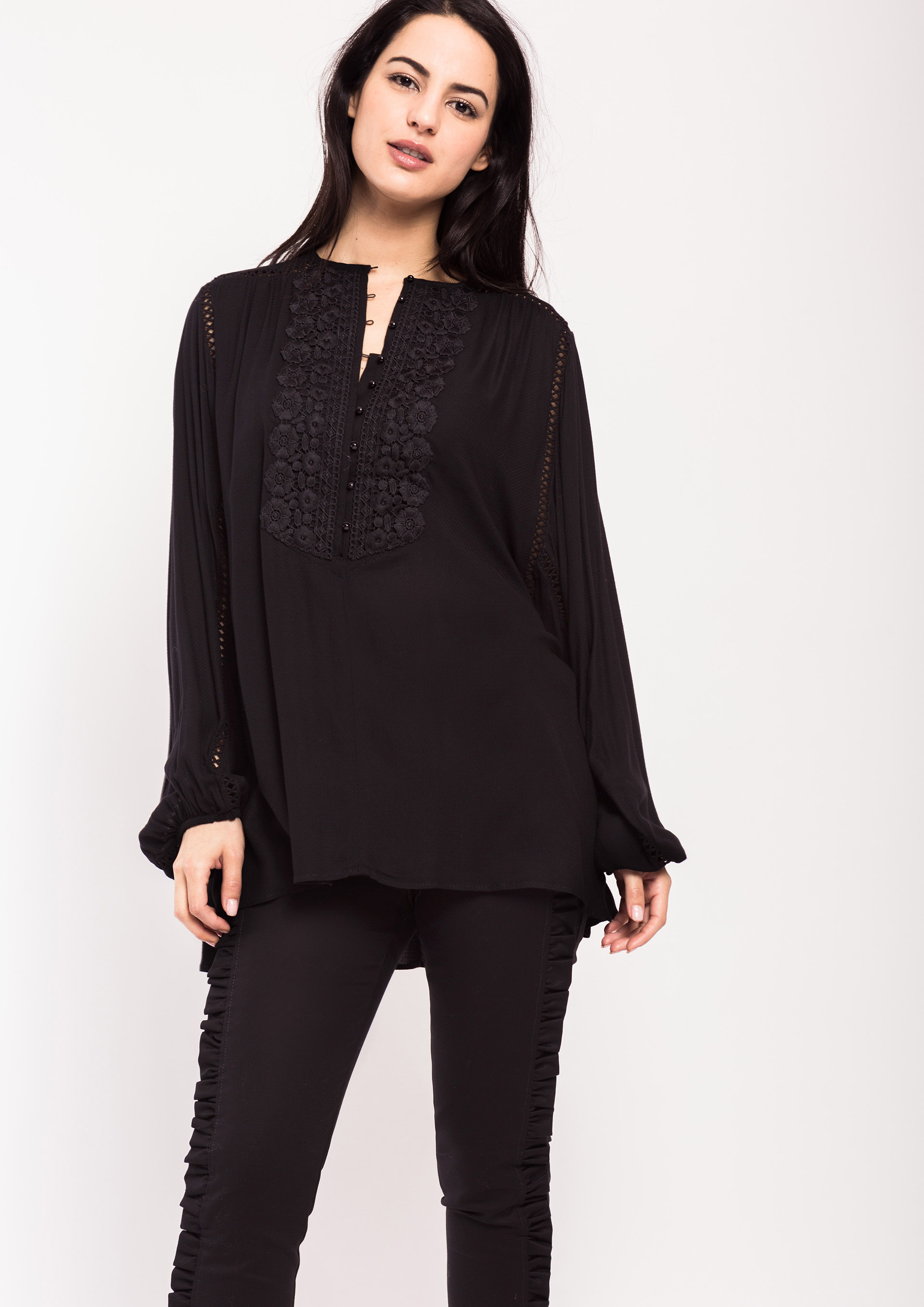 Black fluid blouse with embroidered neckline