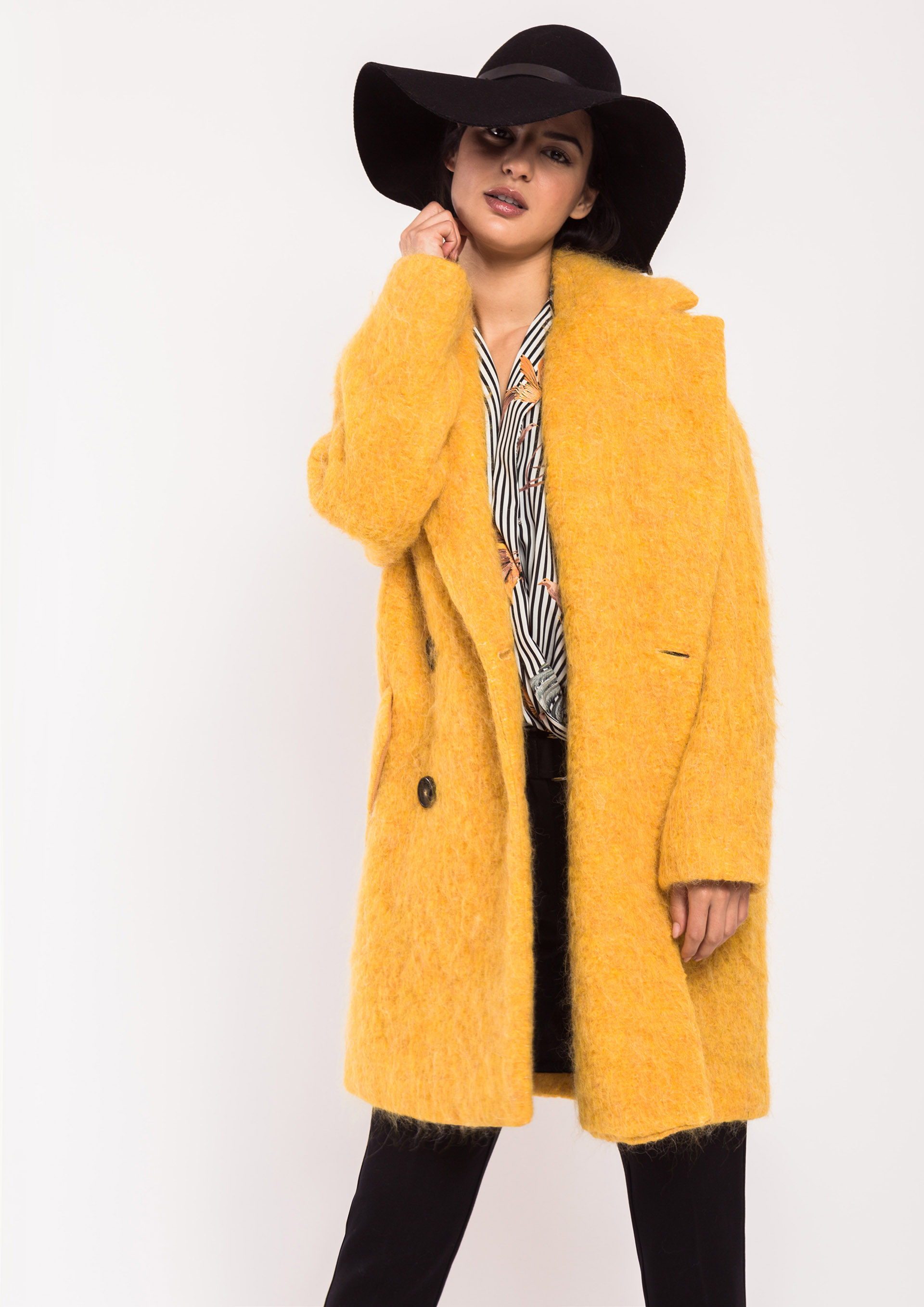 Yellow bouclé coat