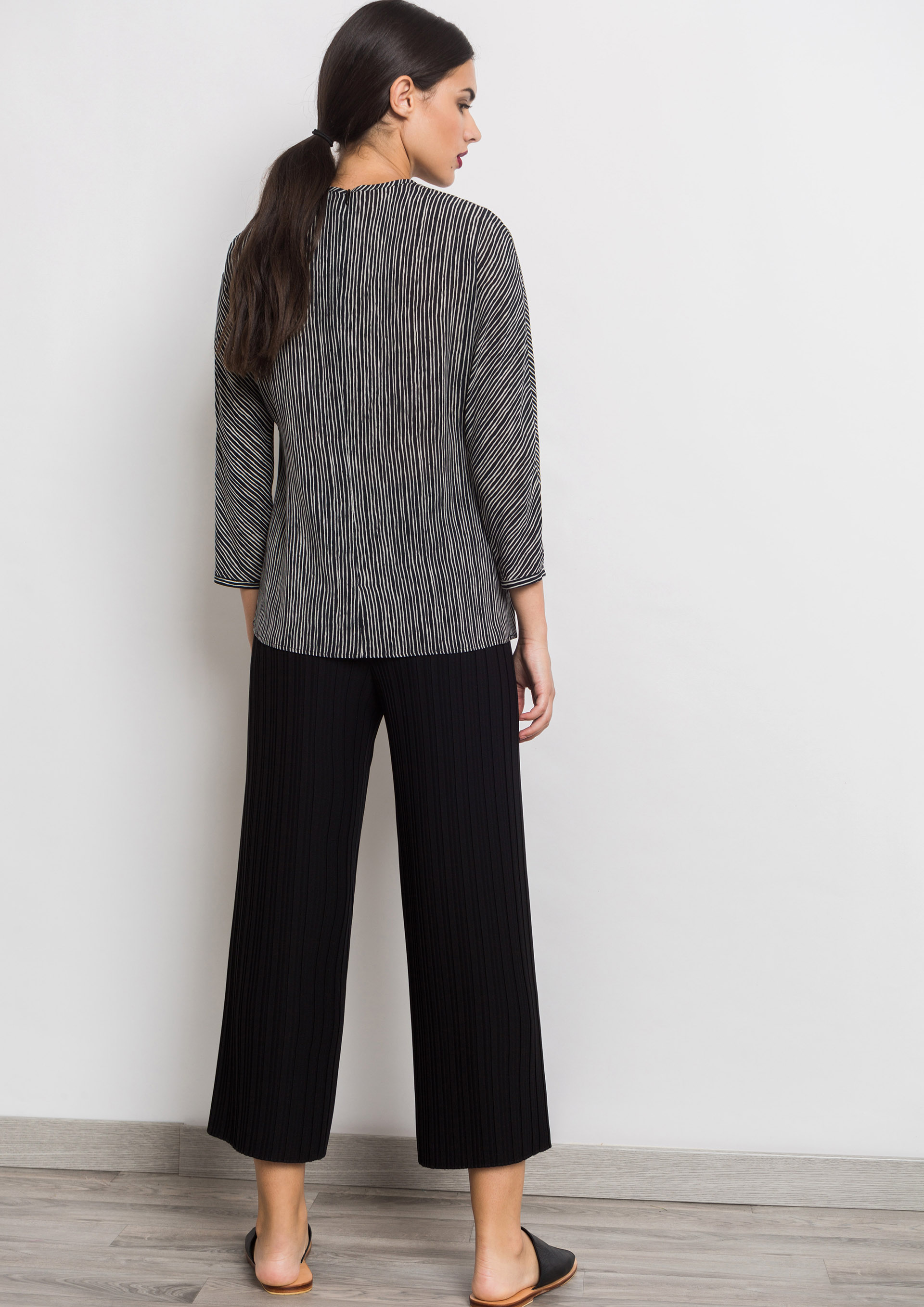 Black pleated culottes