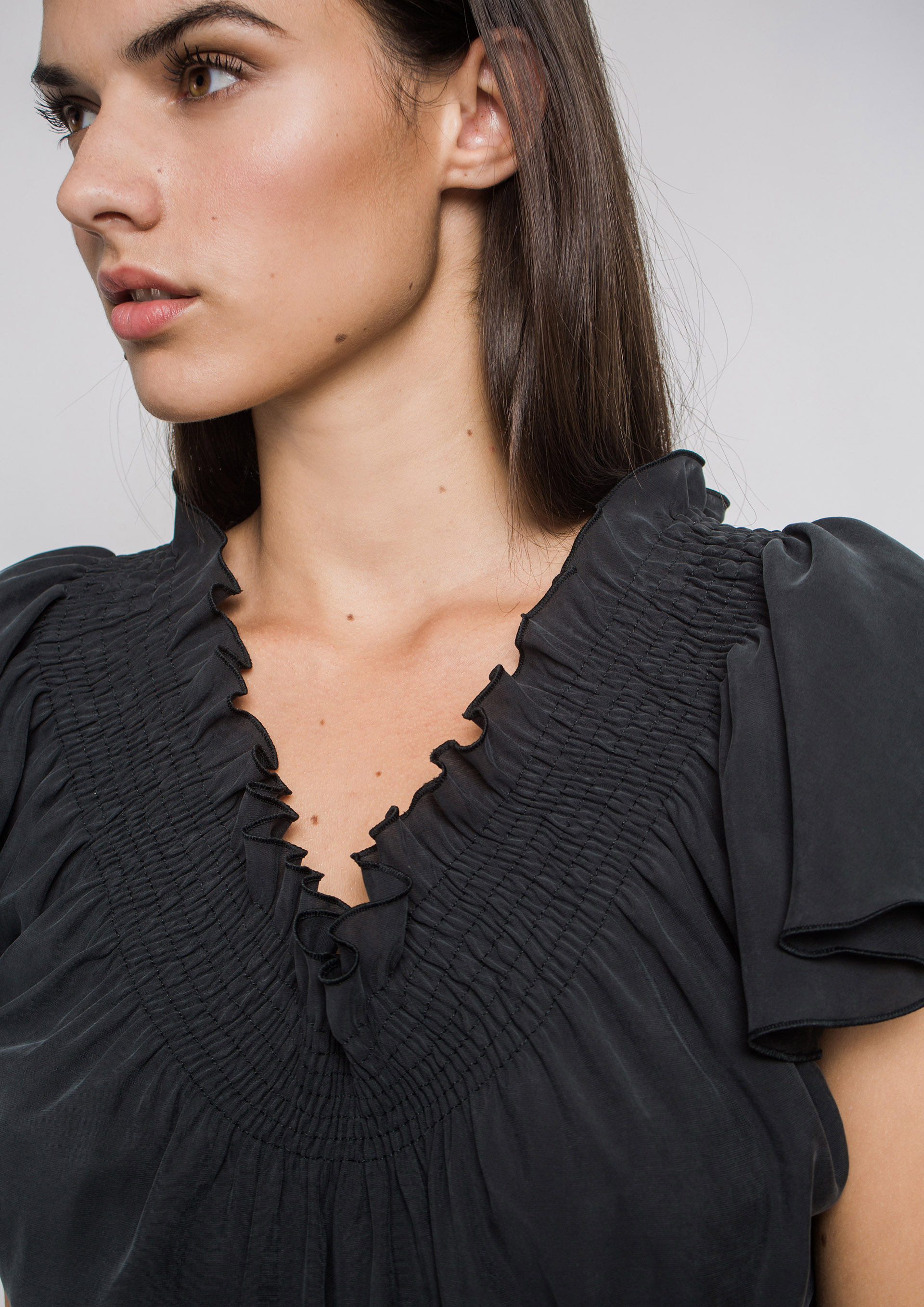 Black top with gathered neckline