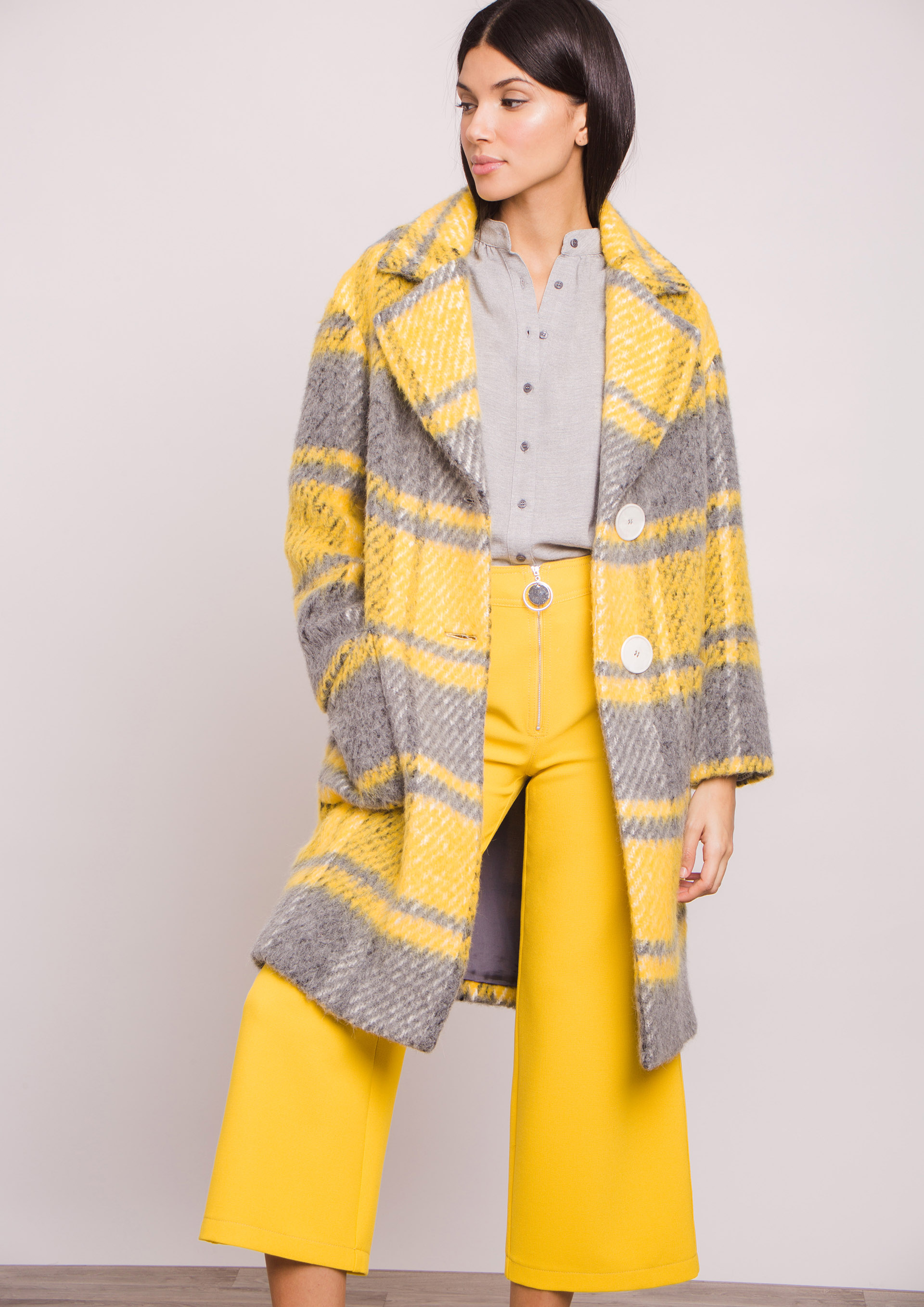 Yellow and grey checked coat.