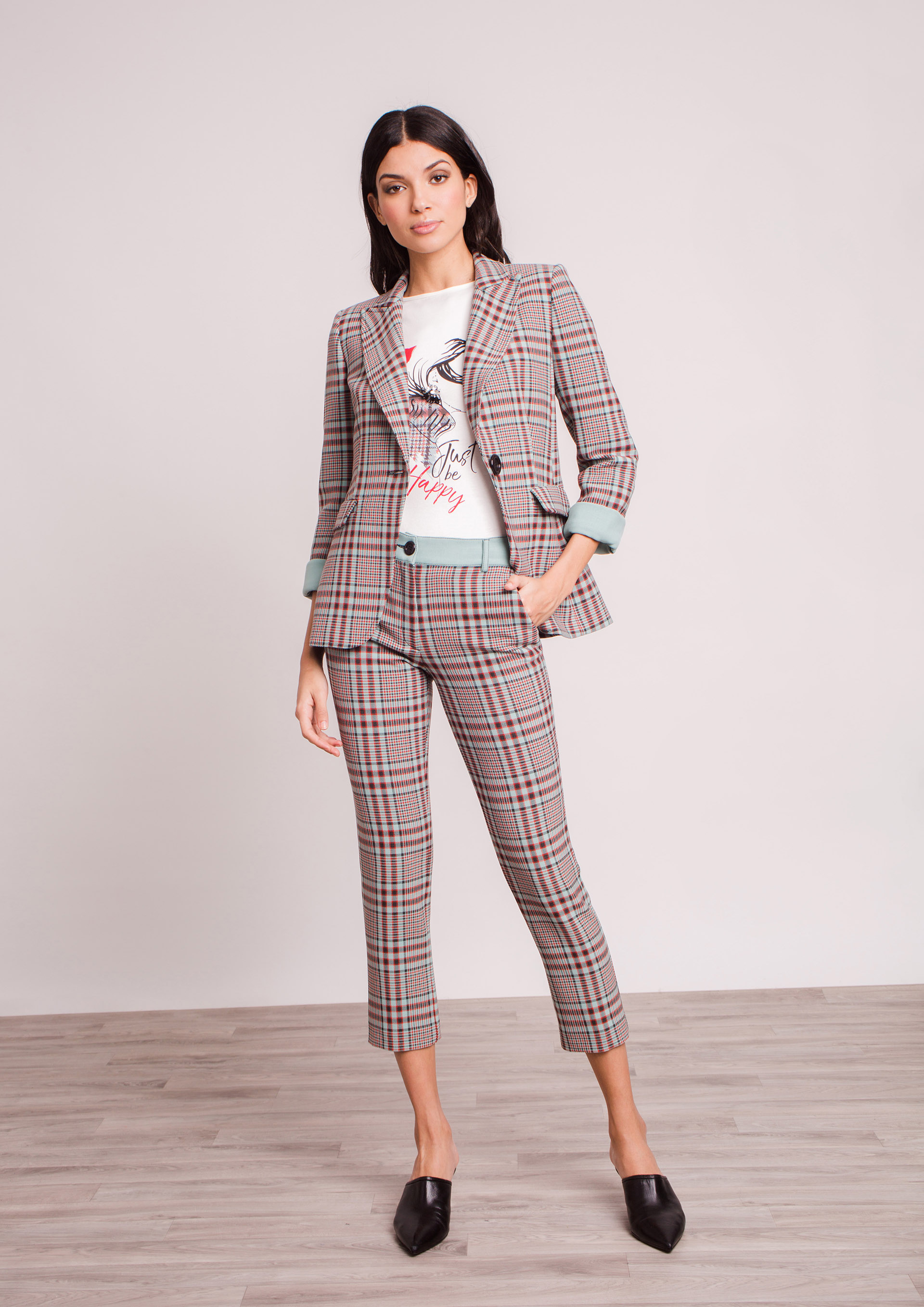 Turquoise checked trousers.