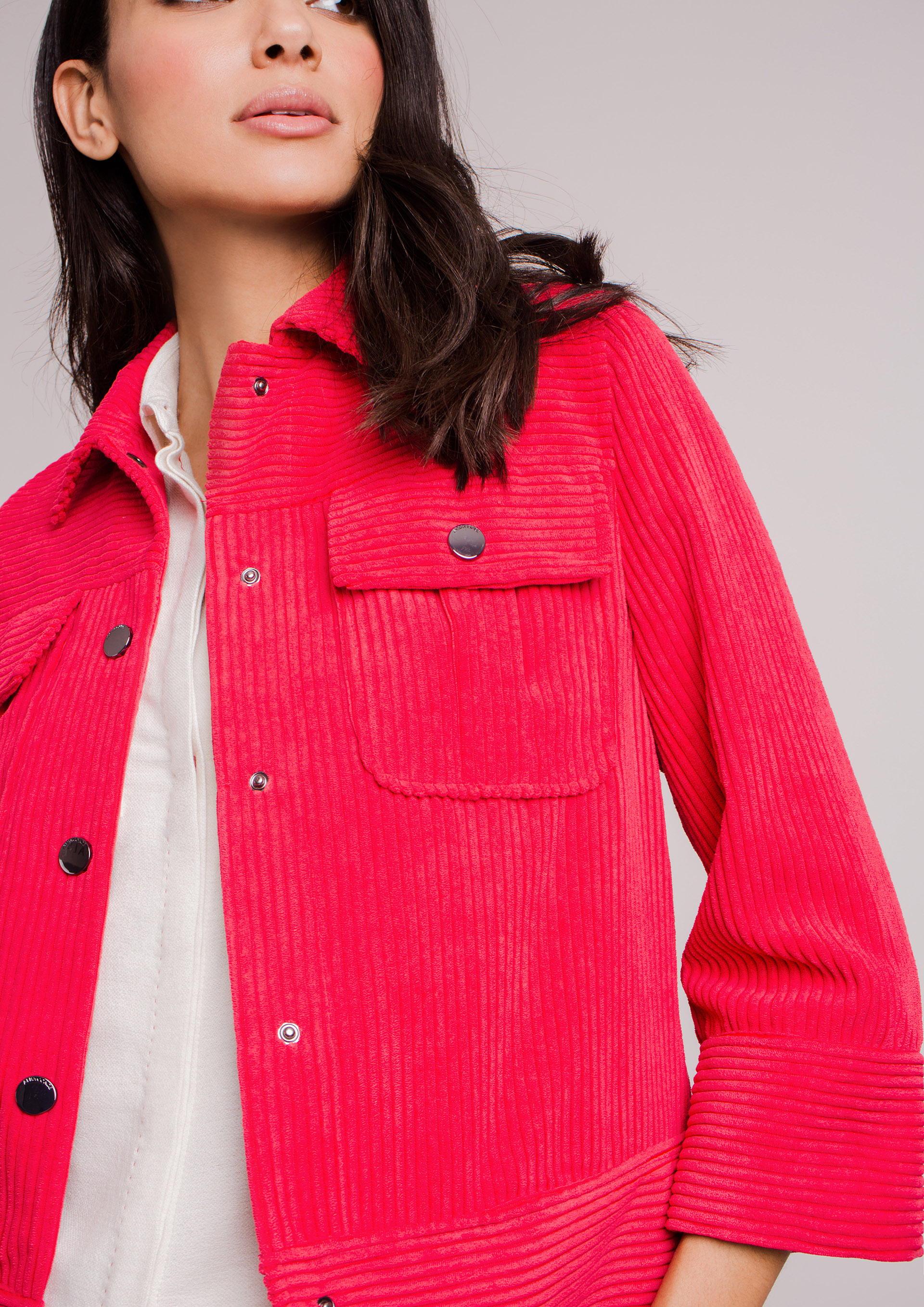 Red corduroy jacket.