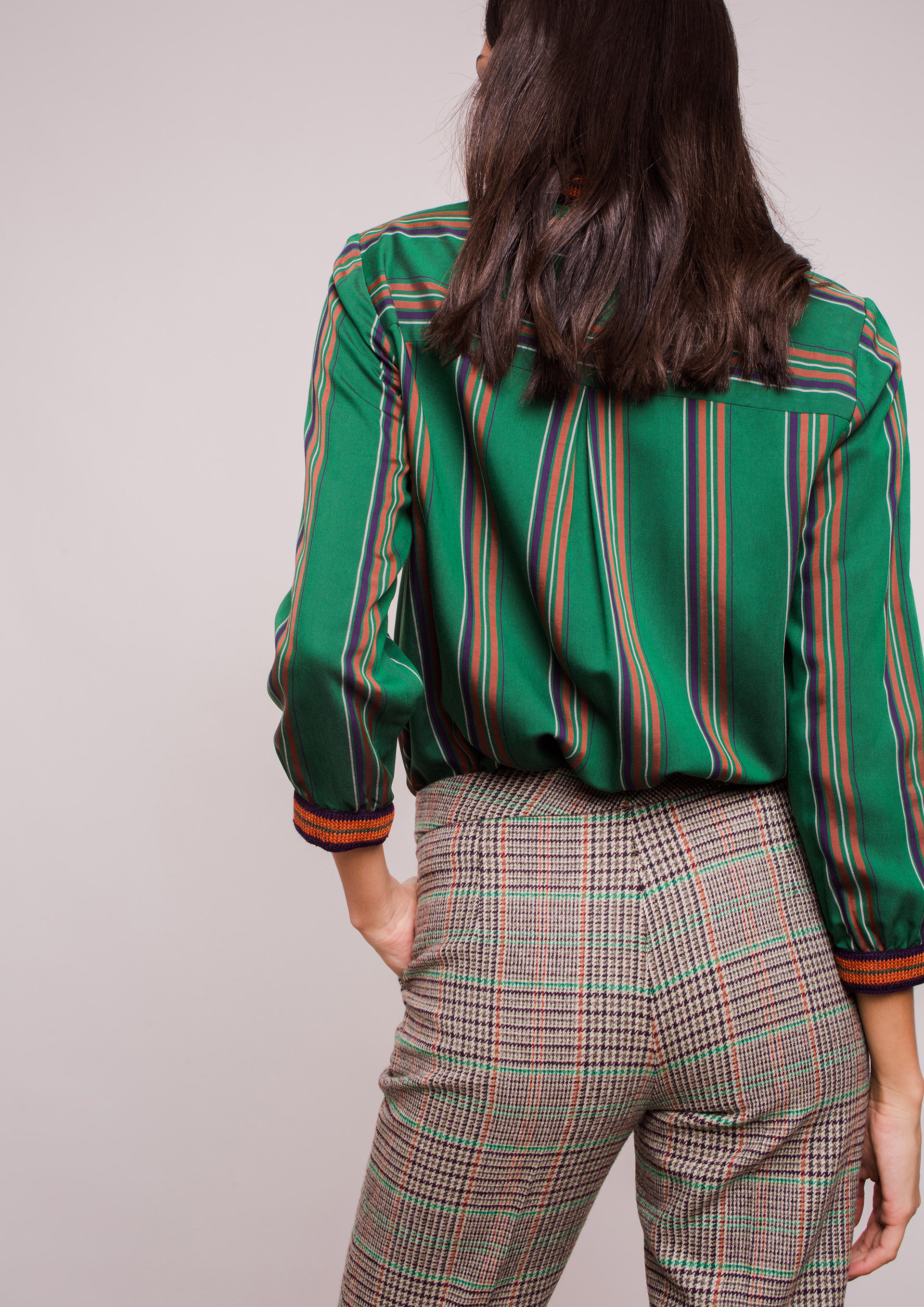 Green striped blouse.