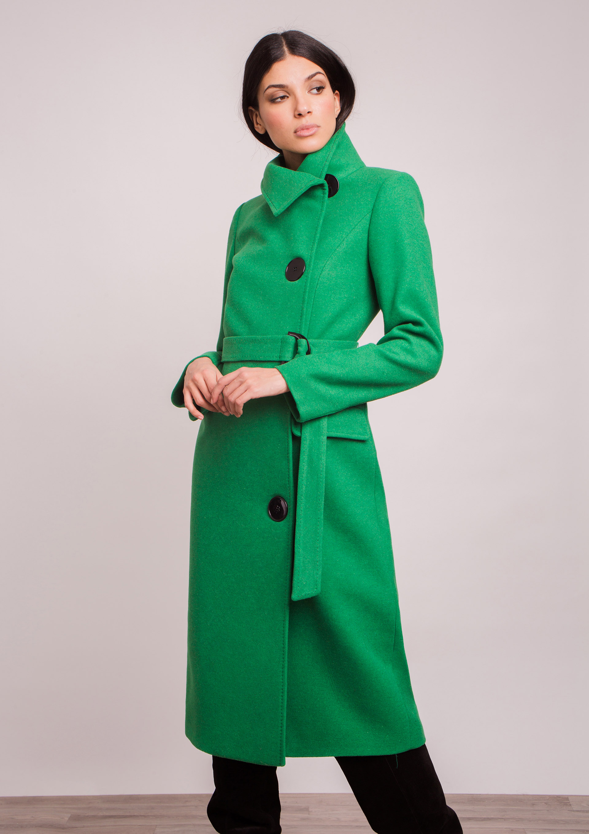 Green coat.