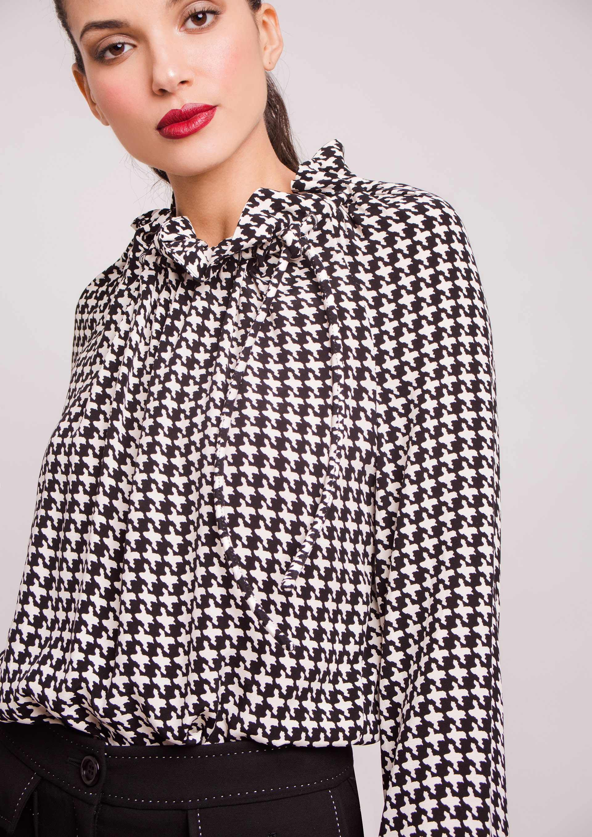 Houndstooth blouse.