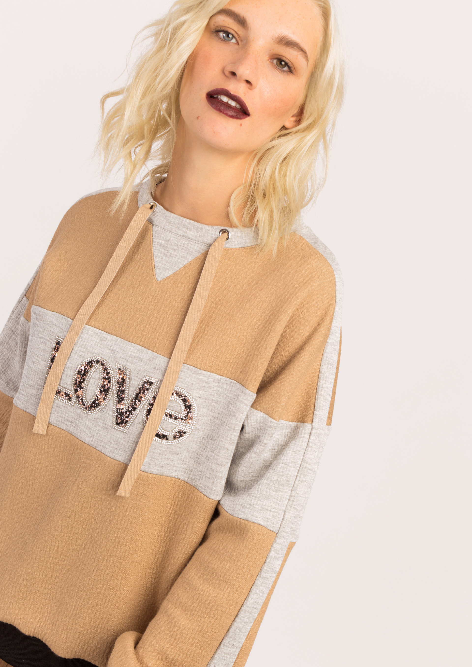 Camel sweatshirt.