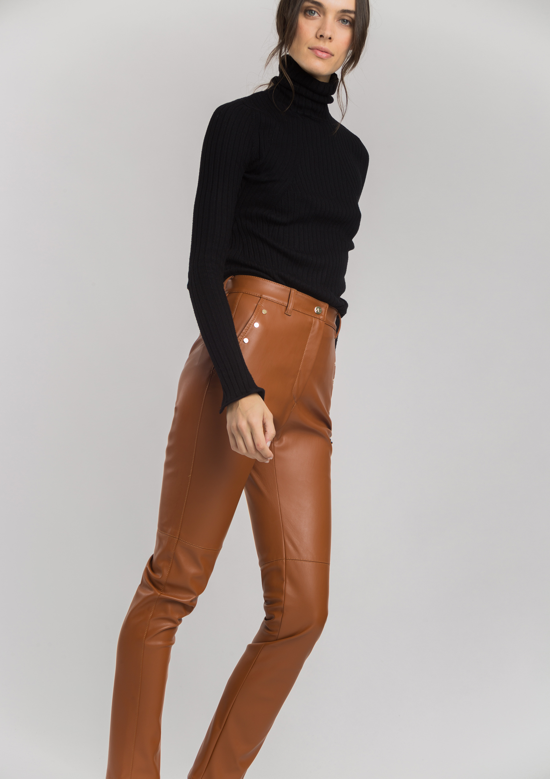 Leather effect trousers in camel.