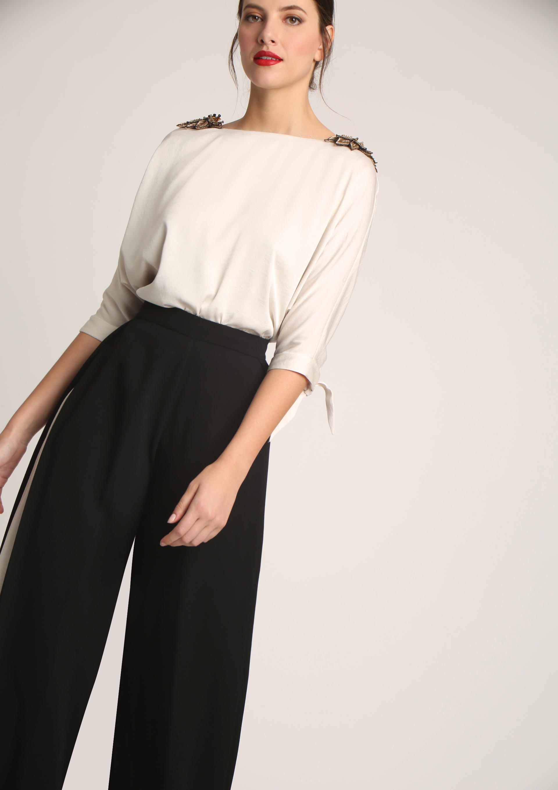 Special occasion blouse with embellished shoulders