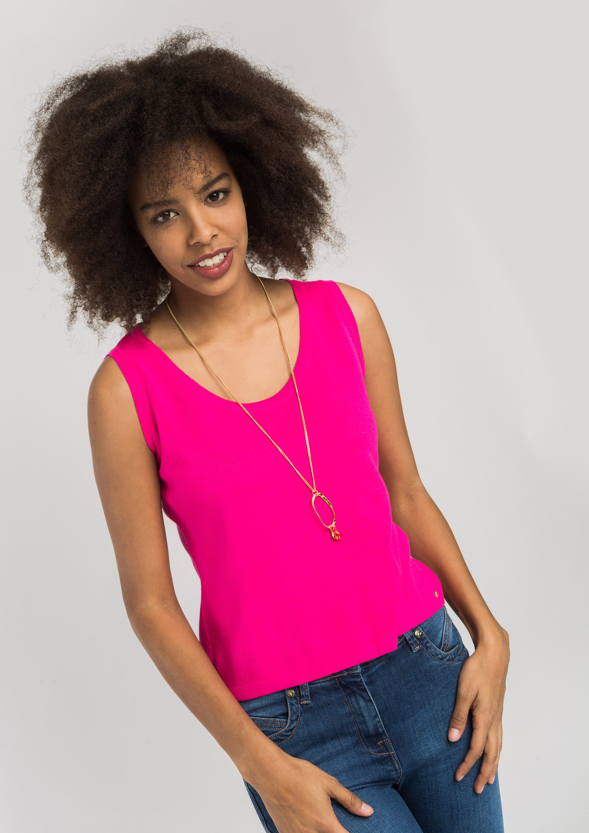 Fuchsia blouse with necklace