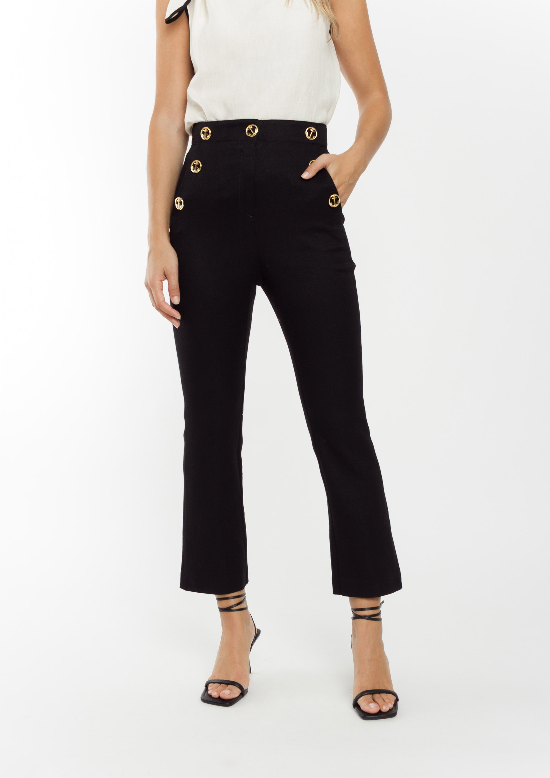 Pantalon negro con shop botones dorados
